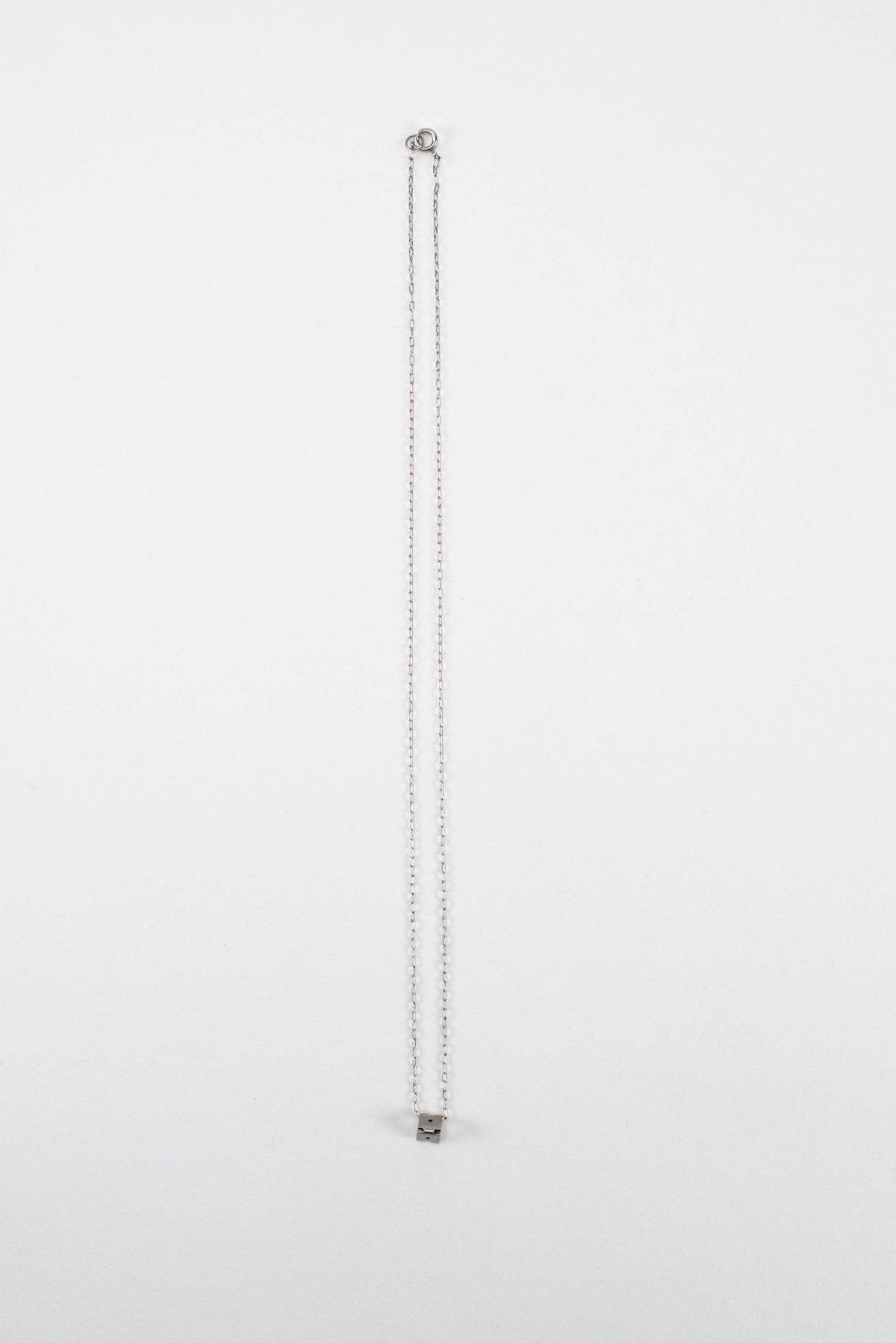 Pixel Pendant - small triangle — image 1 of 4