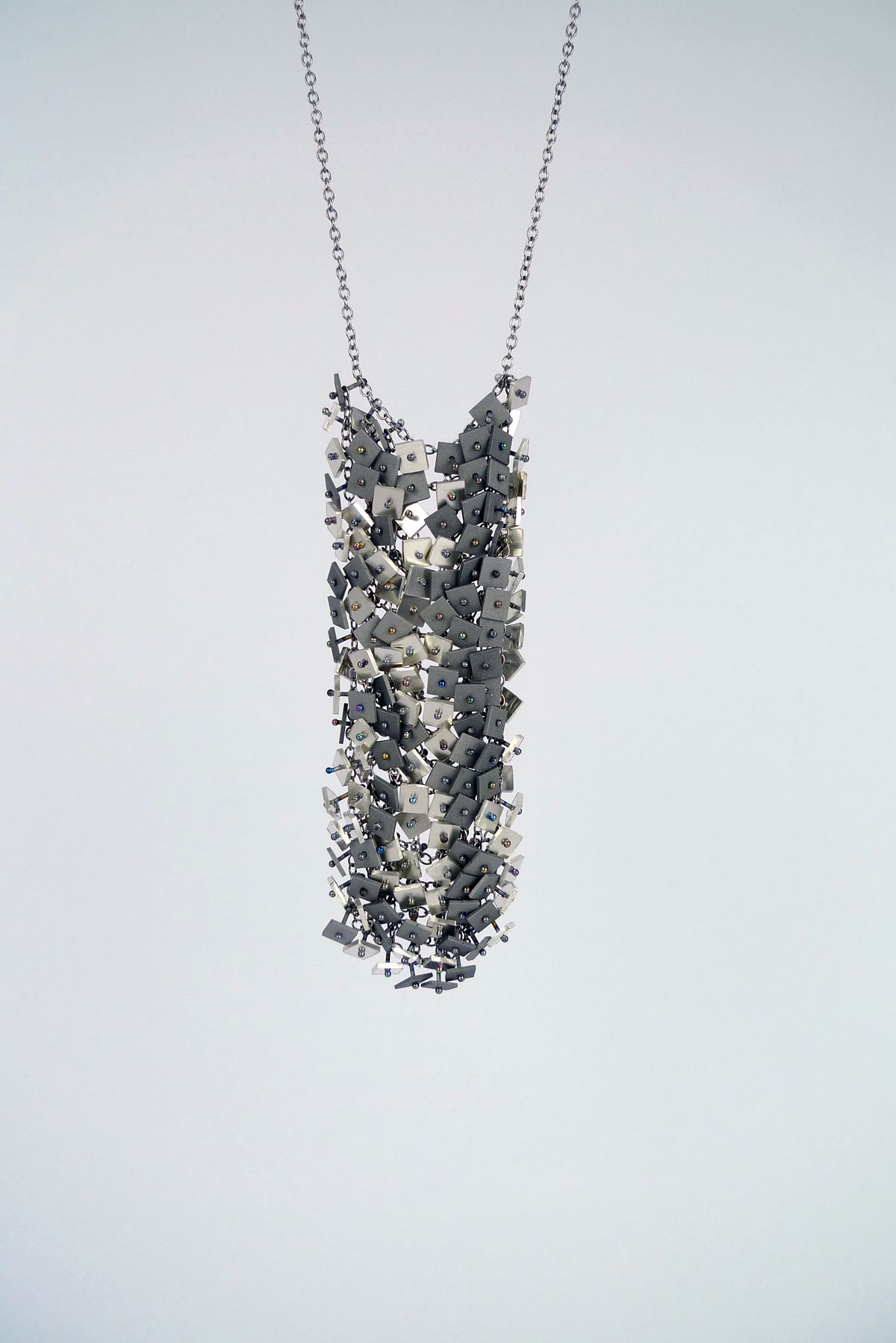 unrepresented body (mirrored) - Neckpiece — image 1 of 2