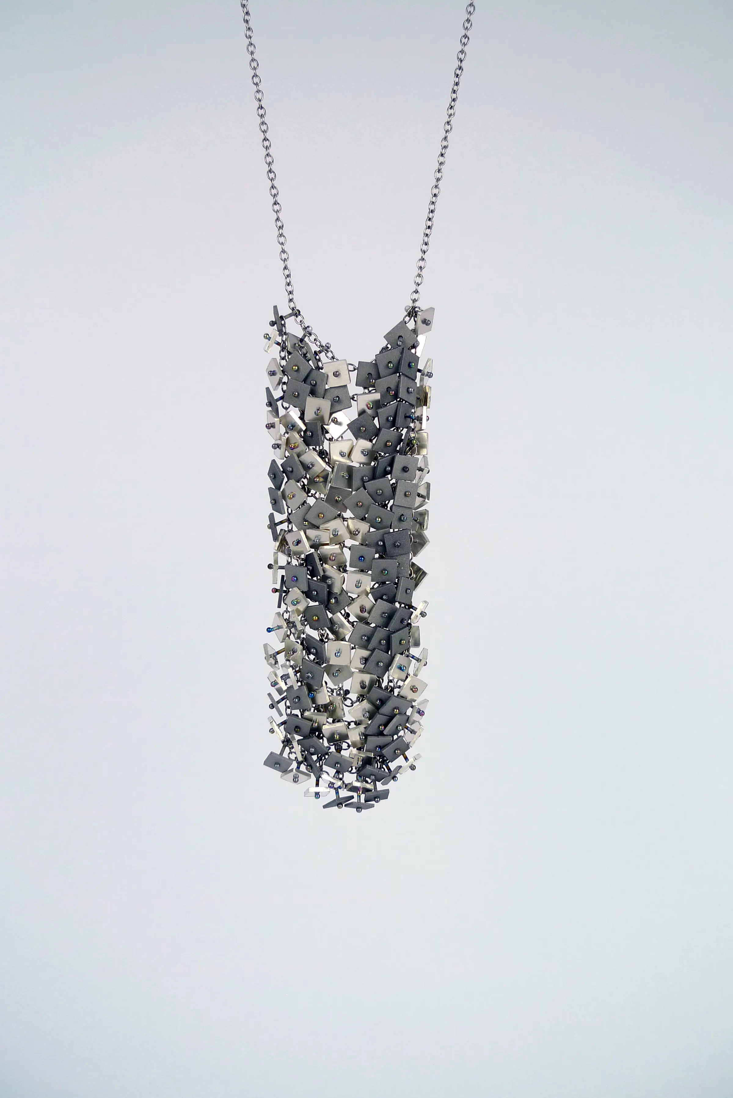unrepresented body (mirrored) - Neckpiece — image 1 of 2